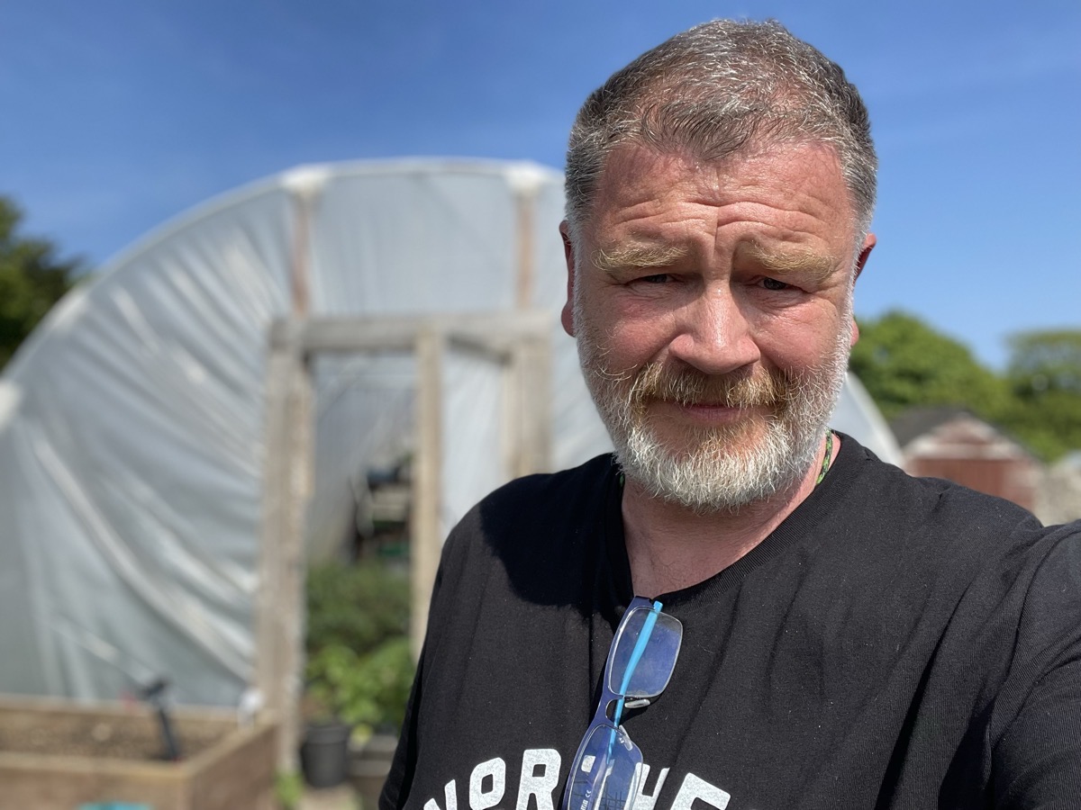 Tony in his polytunnel